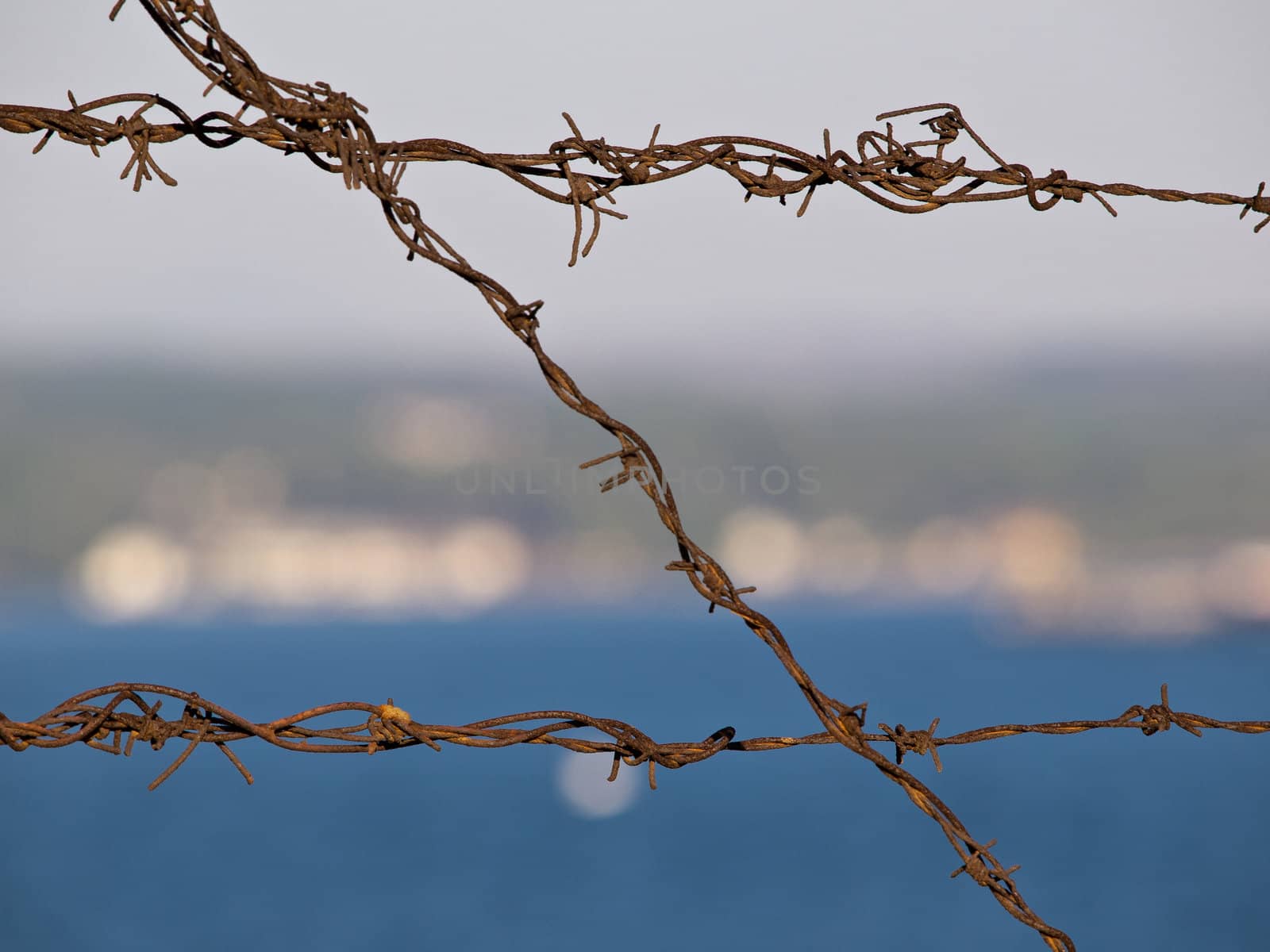 old rusty fence on a county prison