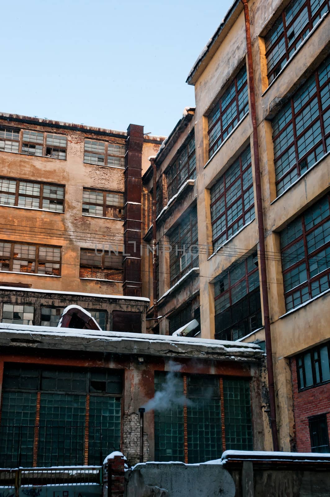 Obsolete, damaged, yellow plant with big windows