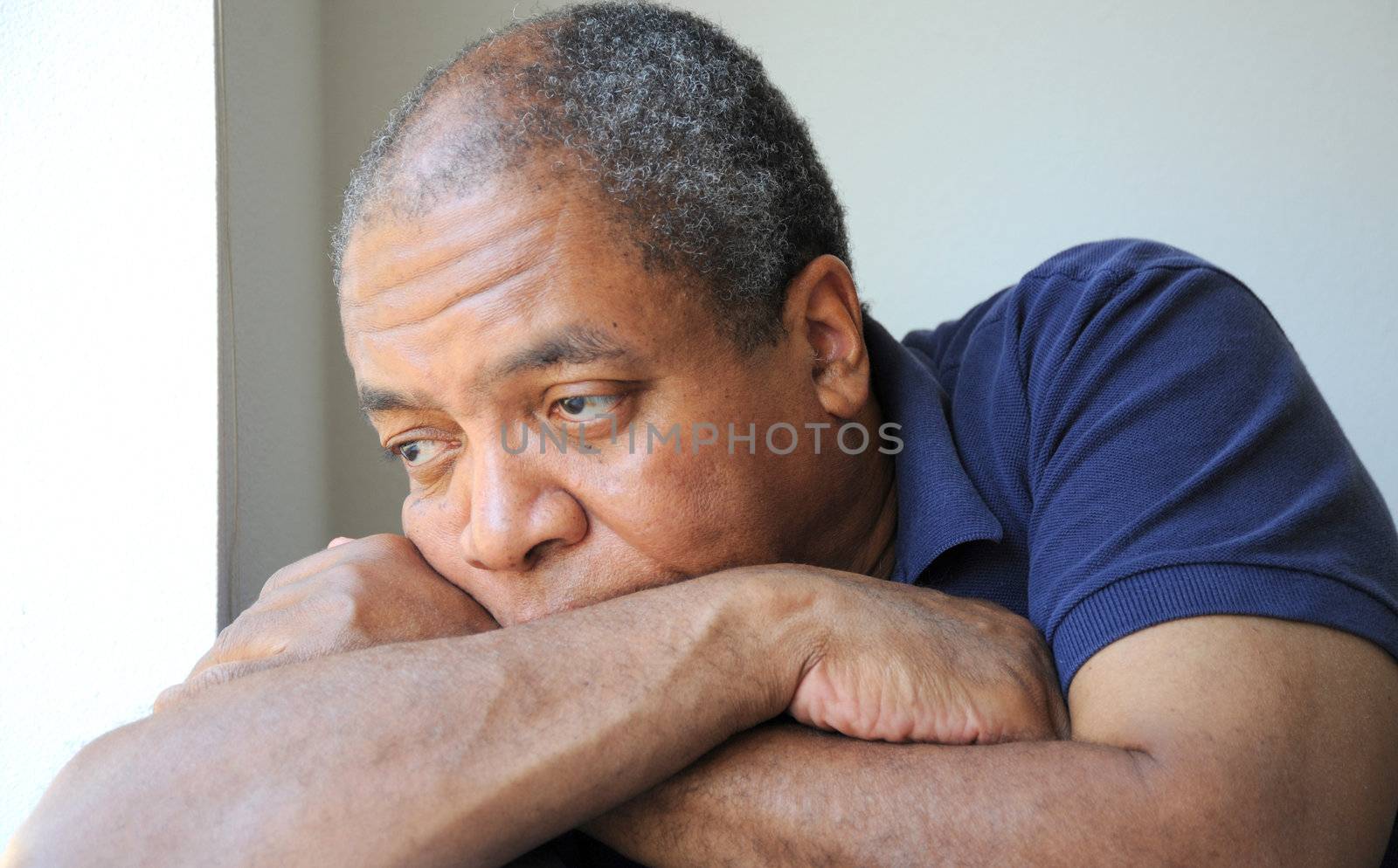 African American male expressions indoors.