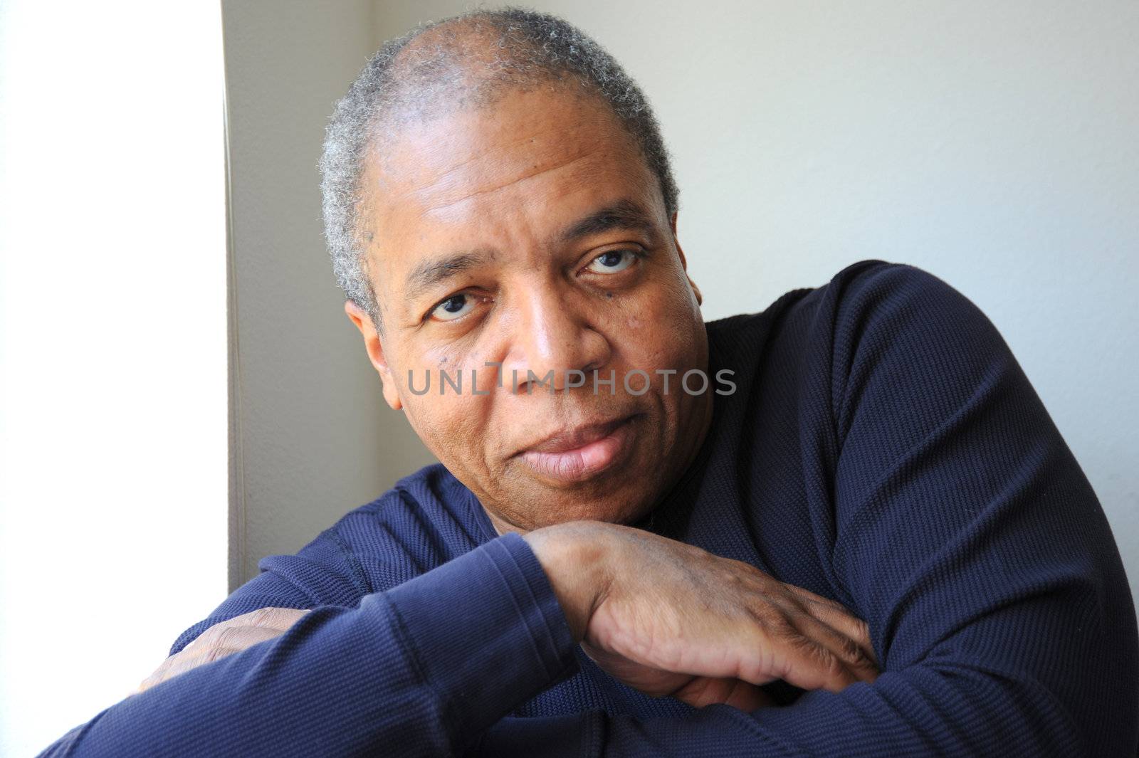 African American male expressions indoors.