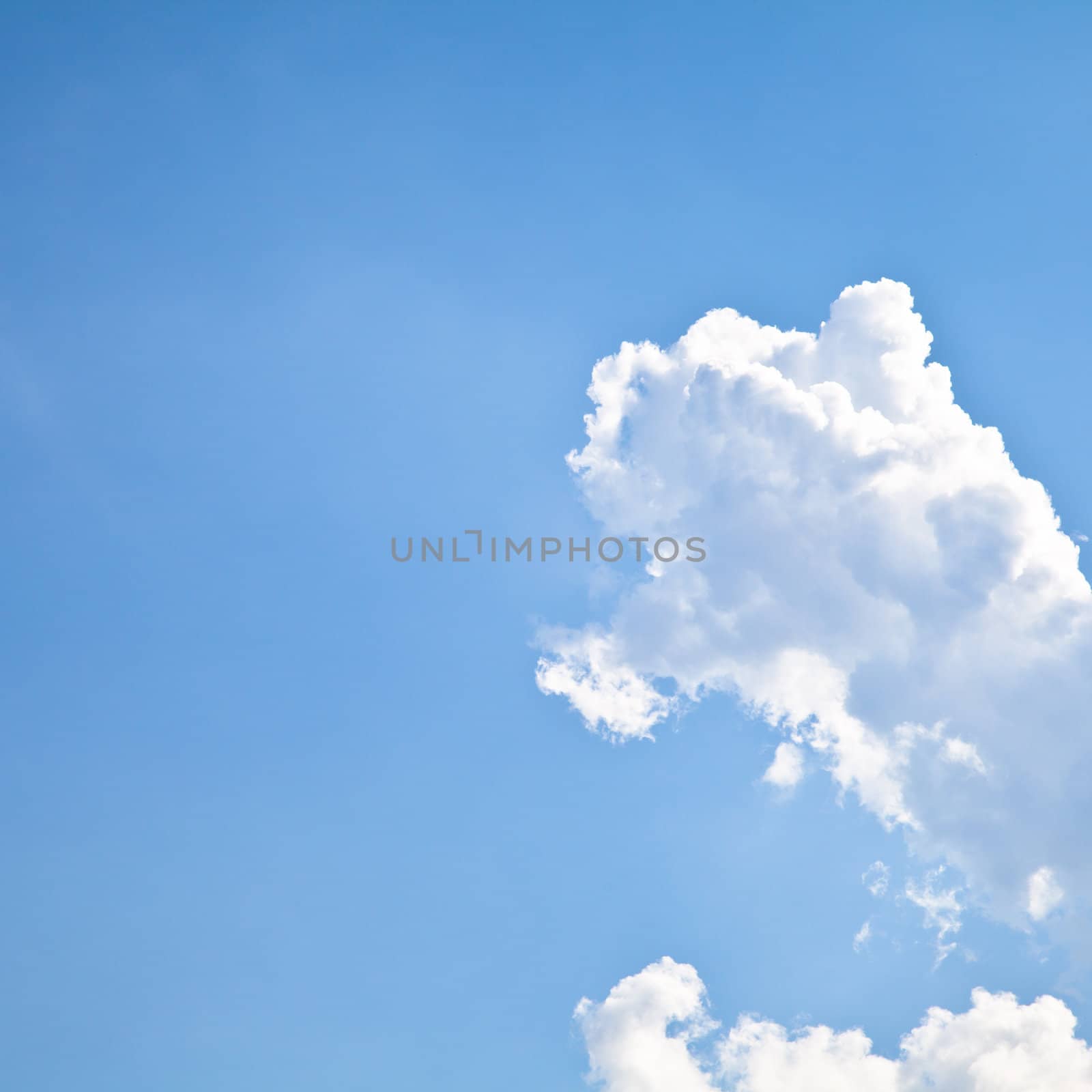 Blue summer sky with white clouds with copy space