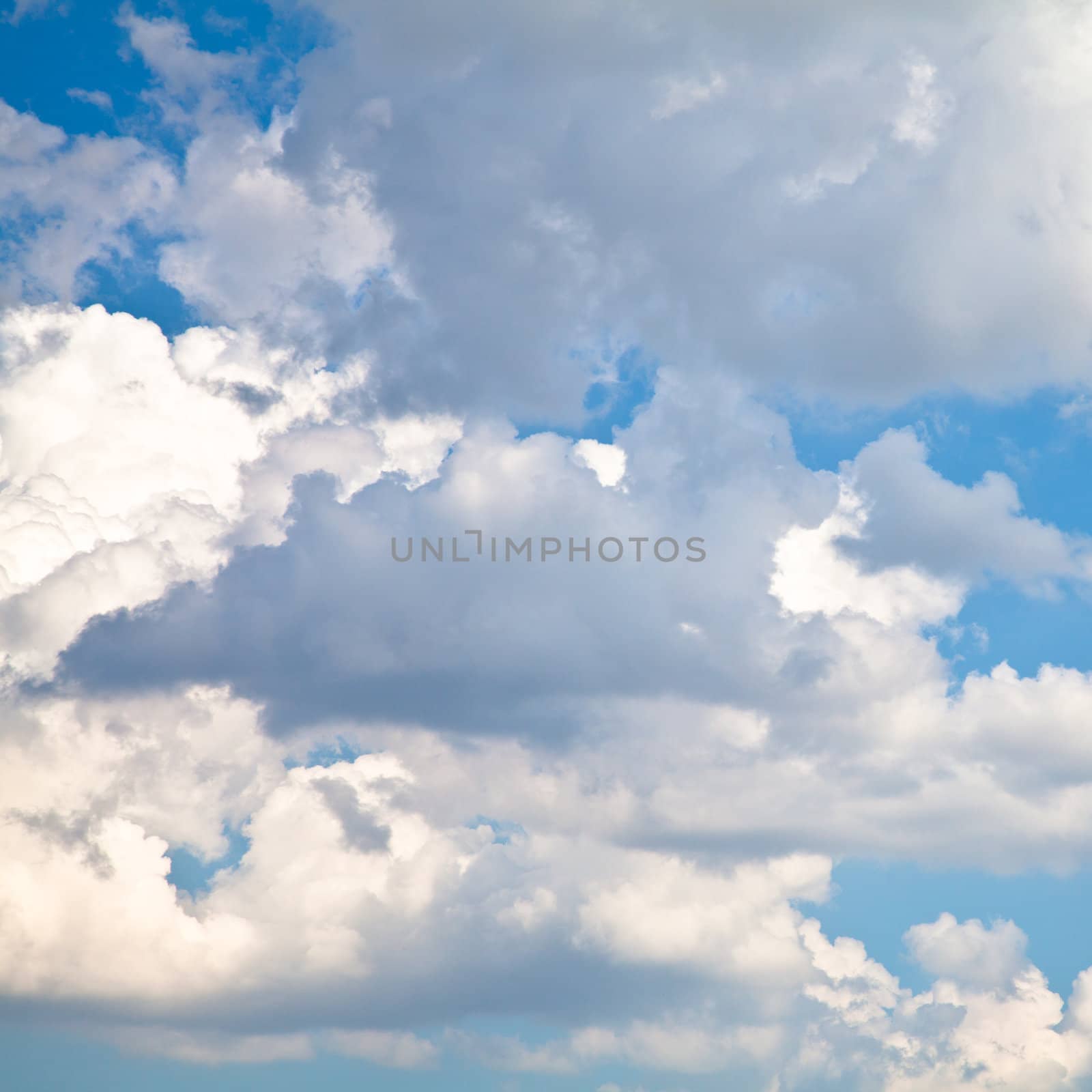 Blue summer sky with white clouds with copy space