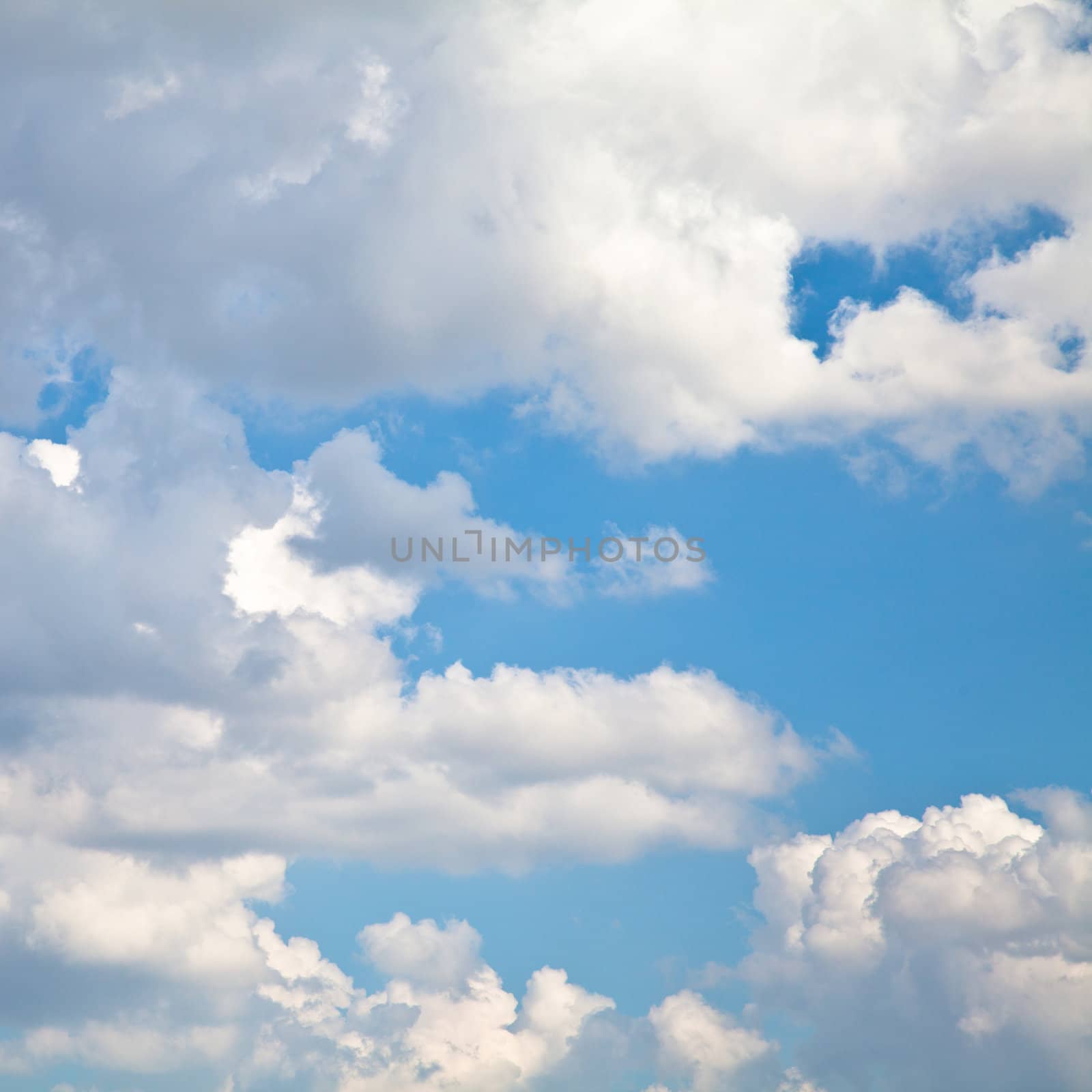 Blue summer sky with white clouds with copy space