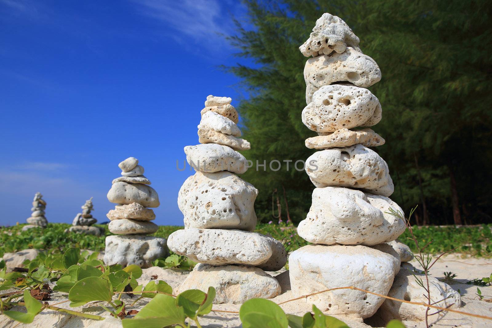 Balanced stones near the beach by rufous