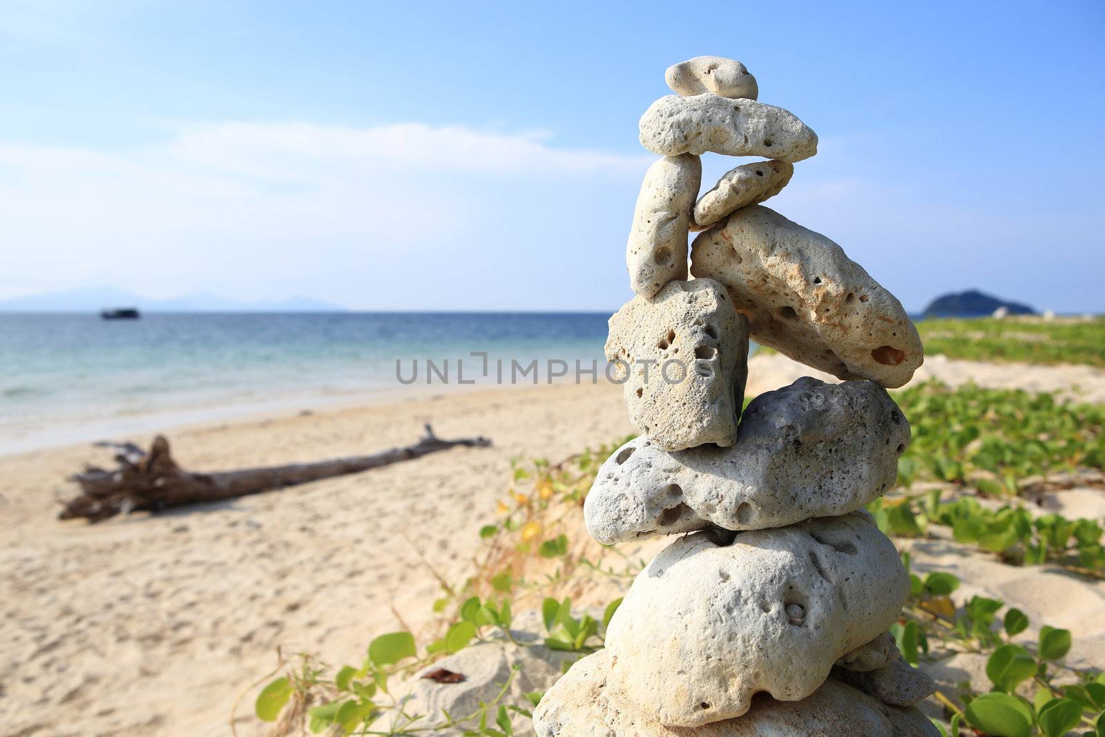 Balanced stones near the beach by rufous