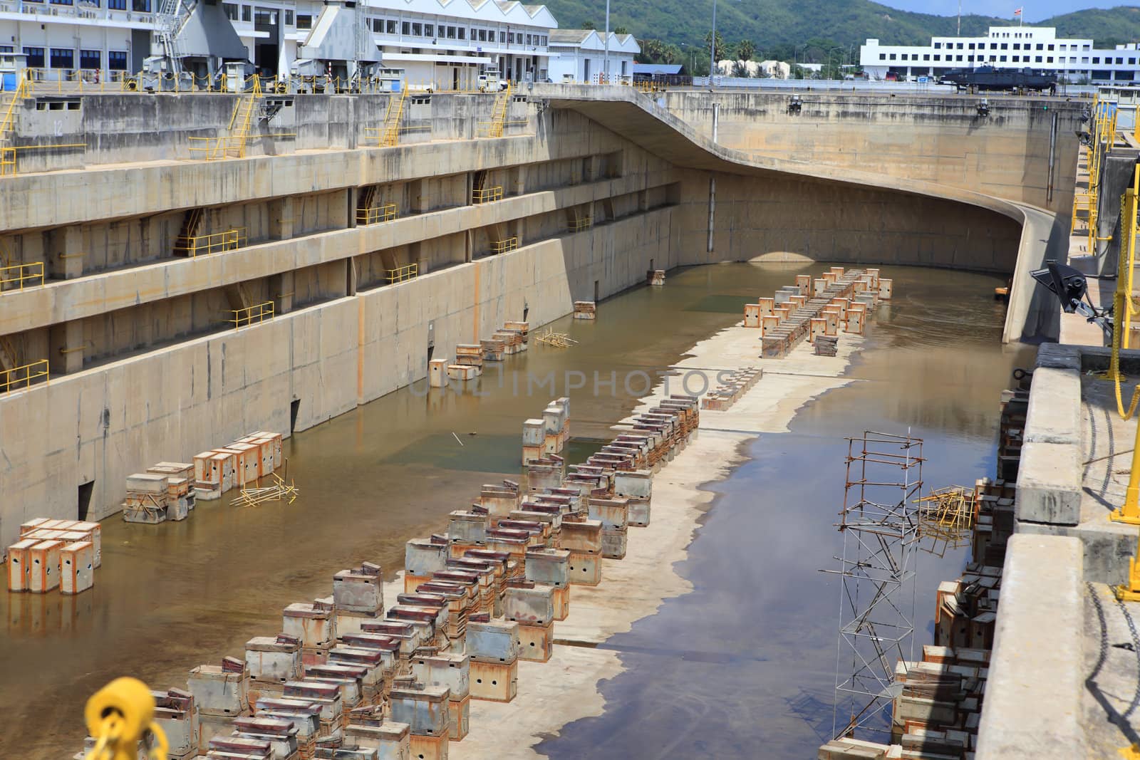 Crane near a covered dry dock at the shipyard