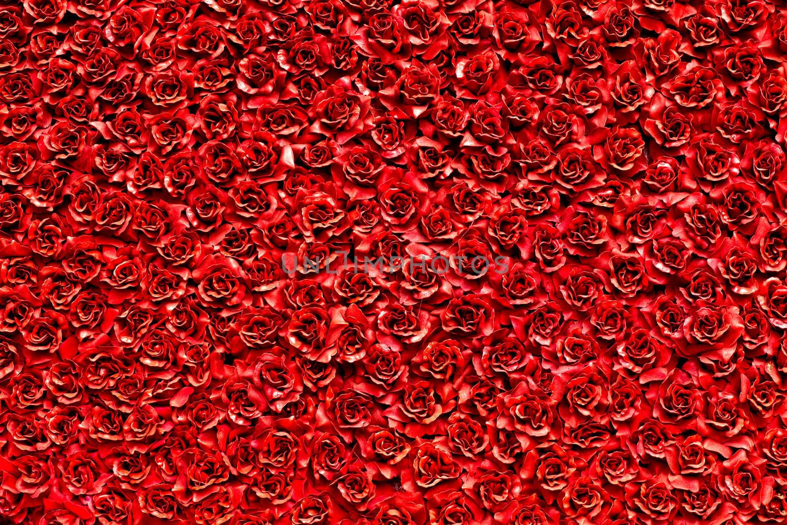 Red artificial rose background ,natural texture of love