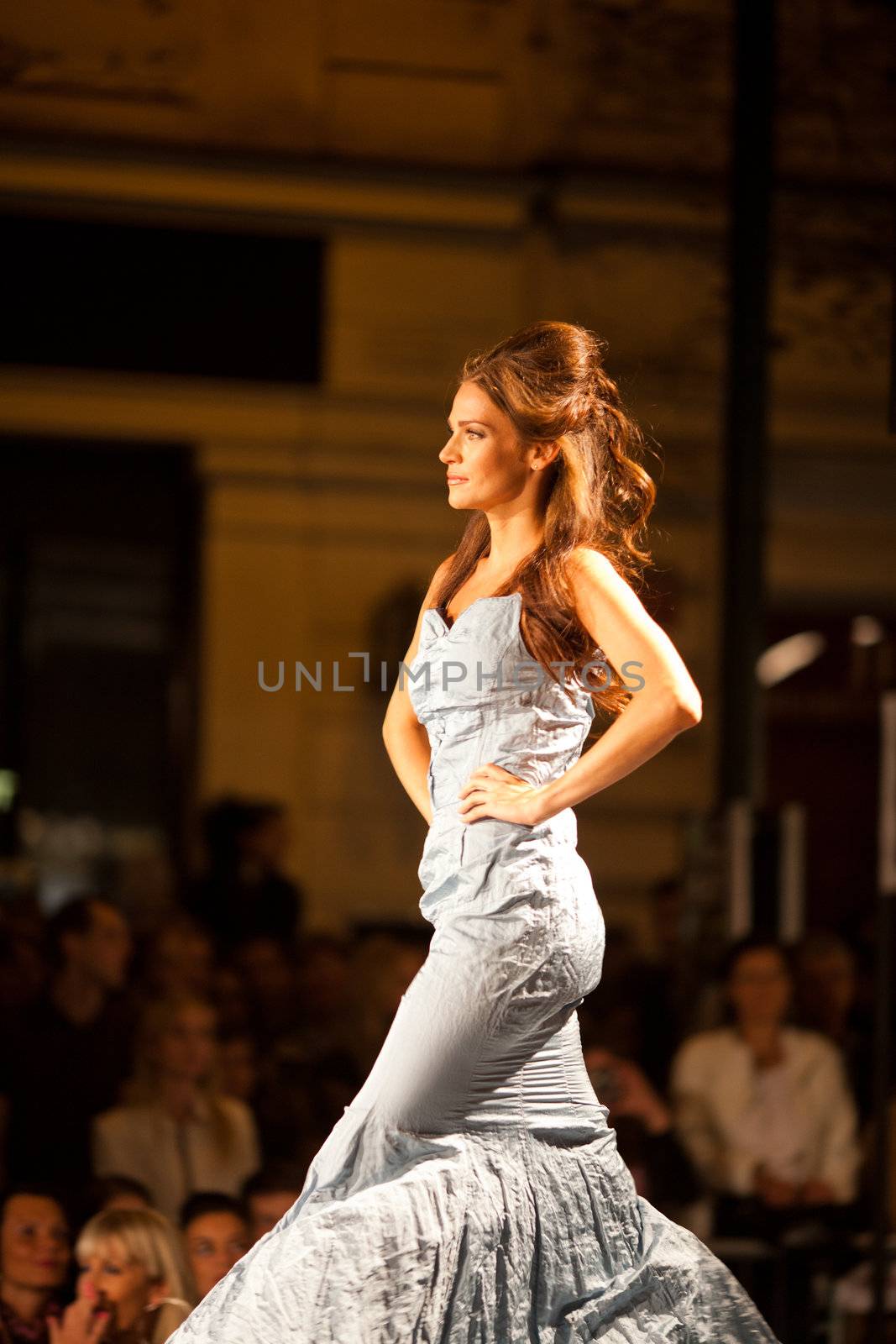 PRAGUE-SEPTEMBER 24: A model walks the runway during the 2011 autumn/winter Nina Ricci Paris Collection by Obsession during the Prague Fashion Weekend on September 24, 2011 in Prague, Czech Republic.