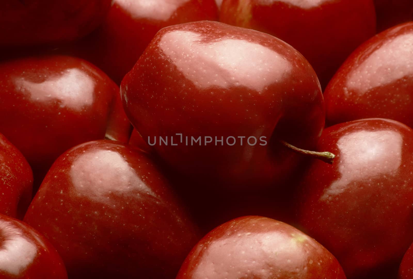 Close-up of a pile of shiny Red Delicious apples