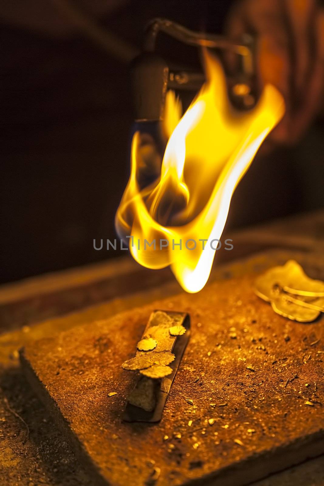 Close-up of the workplace of a jeweller while making a brooch