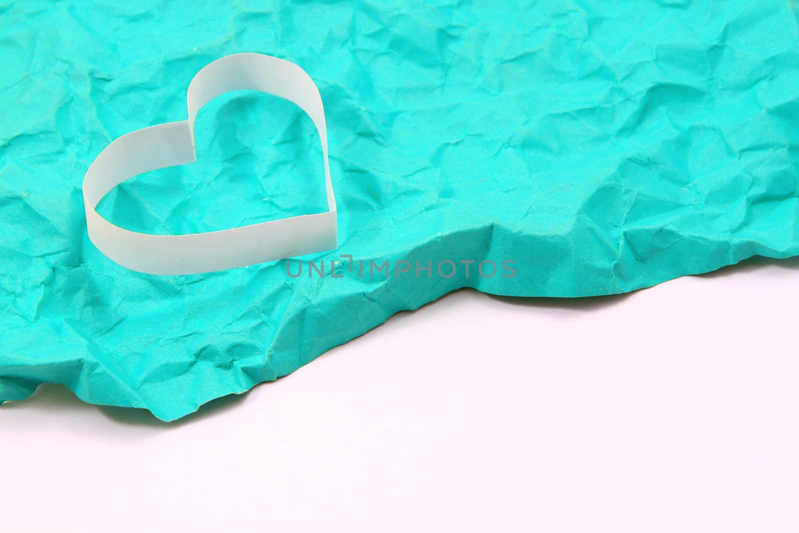 Paper hearts on green background