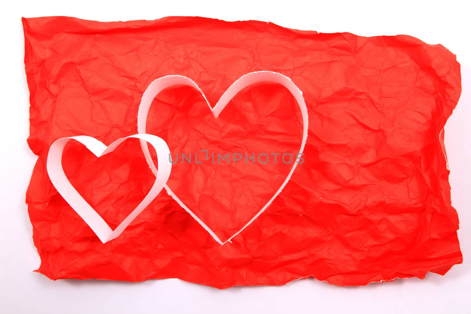 Paper hearts on red background