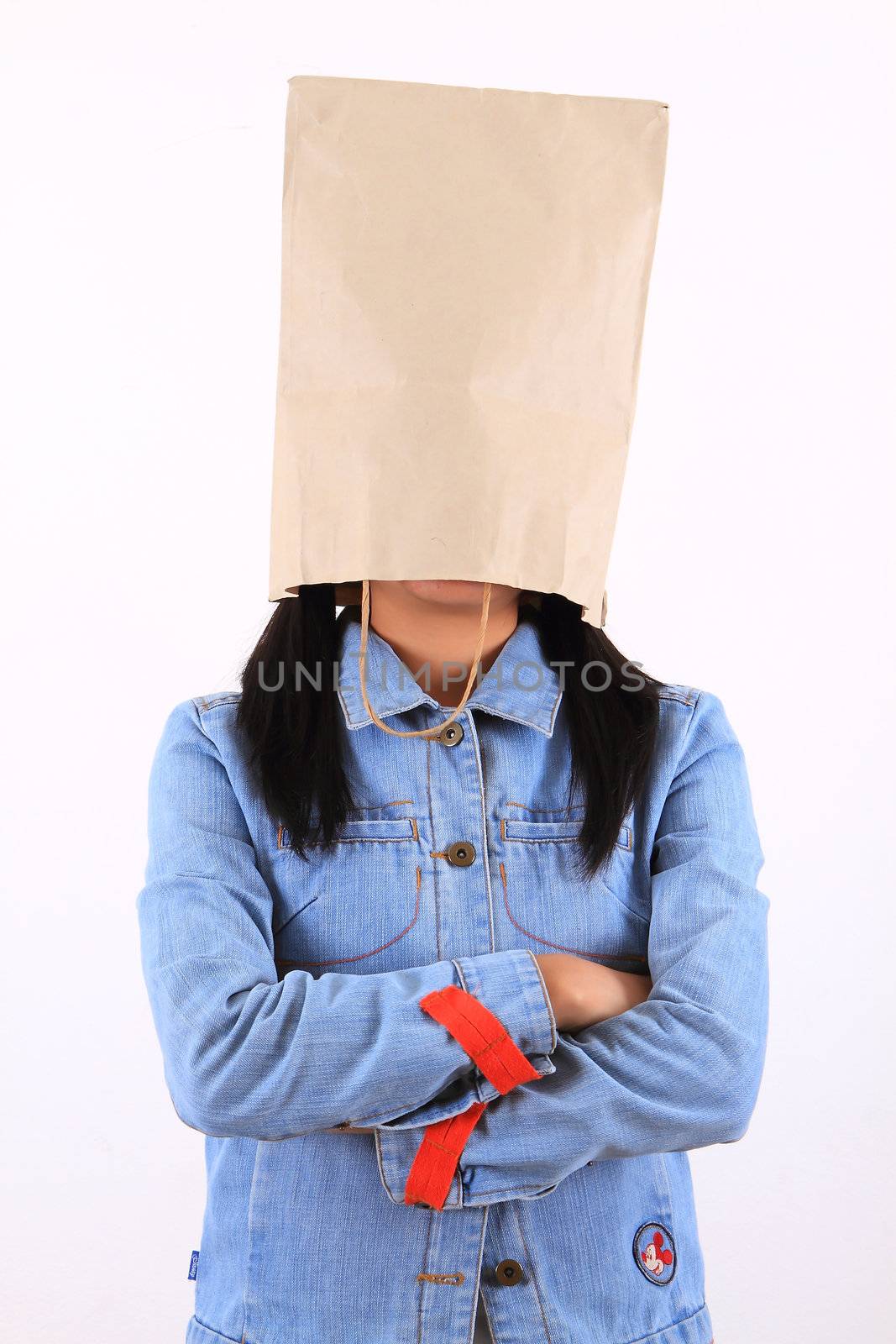 Woman with paper bag on head  by rufous