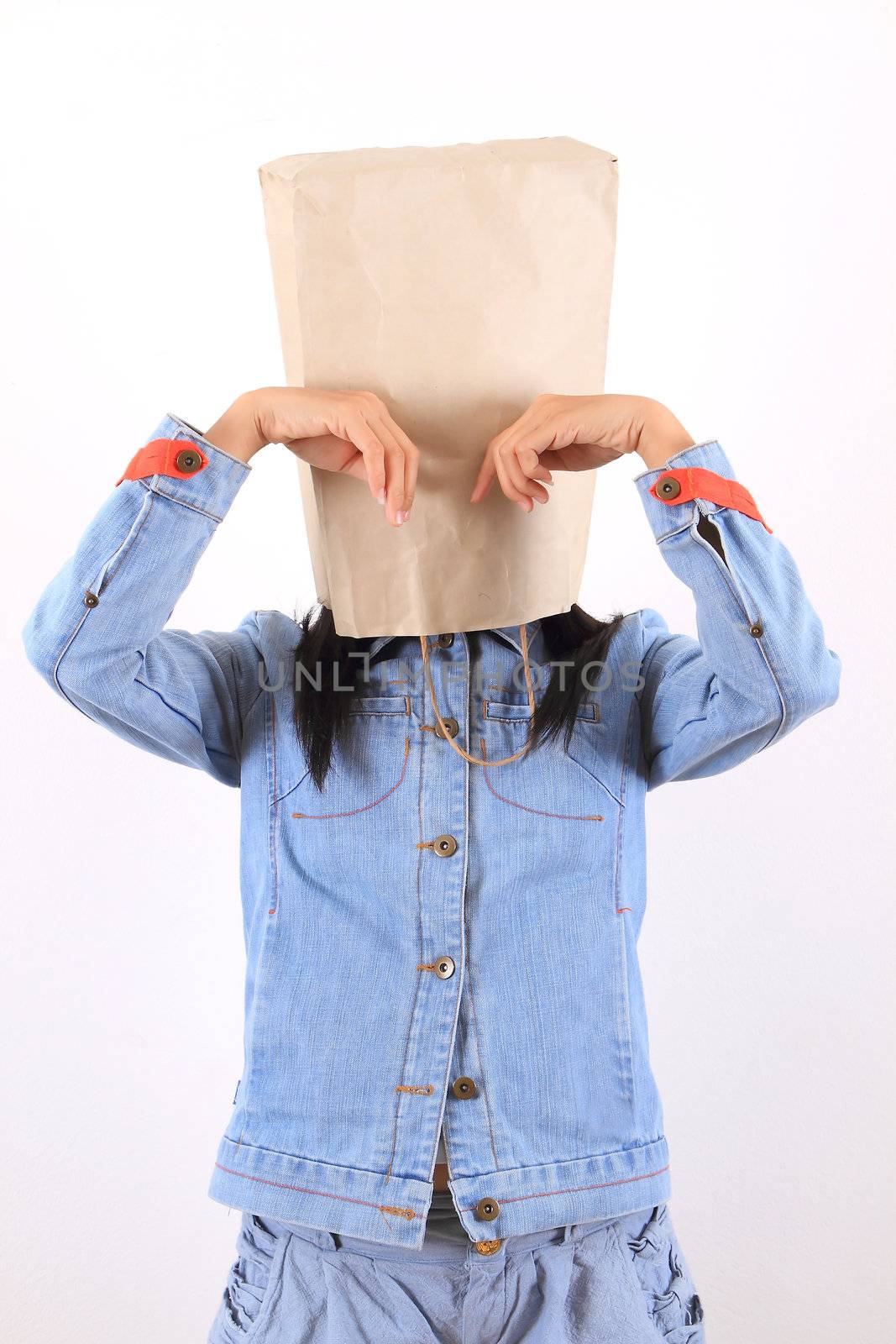 Woman with paper bag on head