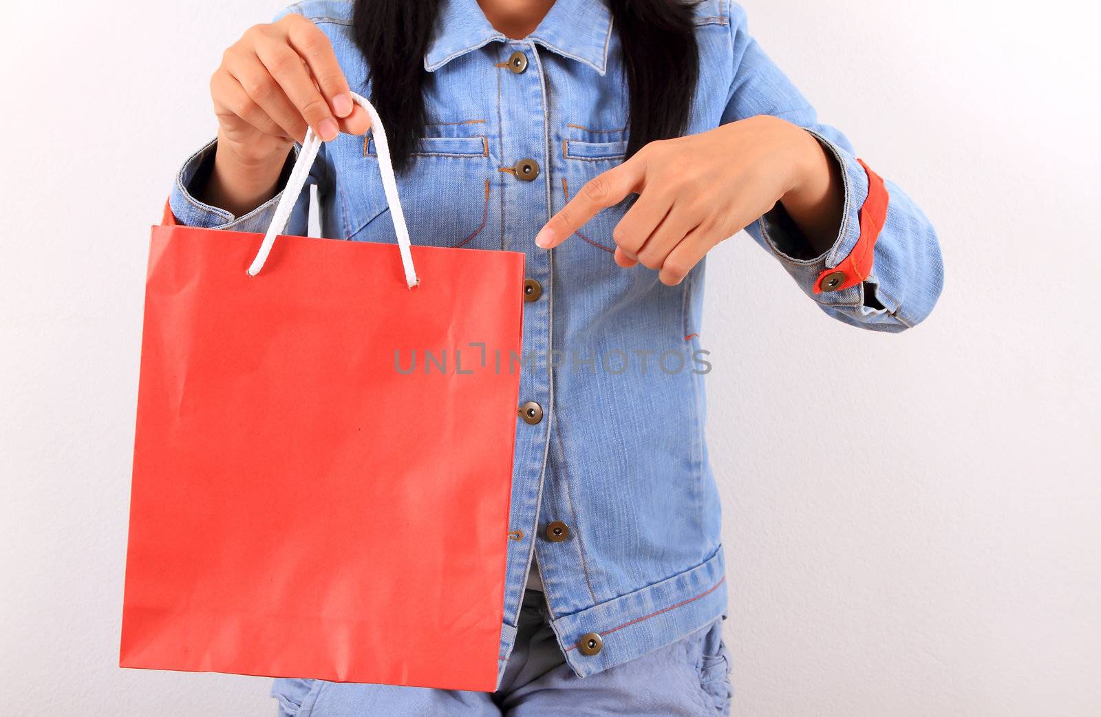 Young model with shopping bag in hands  by rufous