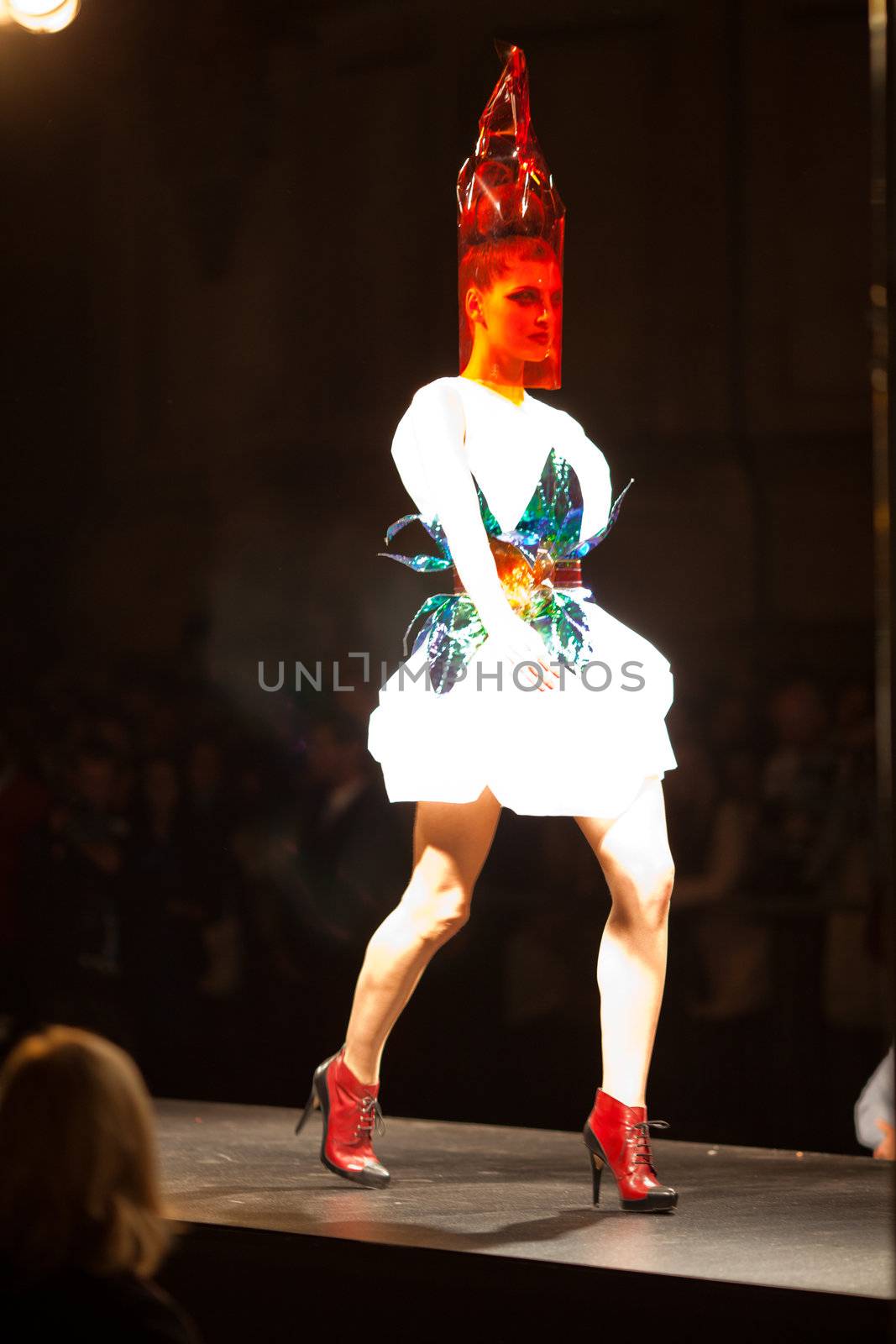 PRAGUE-SEPTEMBER 24: A model walks the runway during the 2011 autumn/winter Nina Ricci Paris Collection by Obsession during the Prague Fashion Weekend on September 24, 2011 in Prague, Czech Republic.