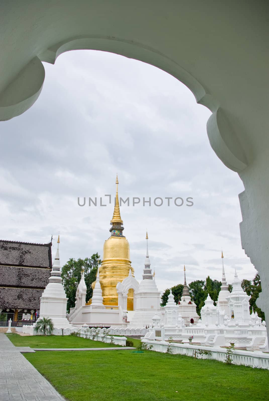 Golden pagoda in Buddhist temple by pixbox77