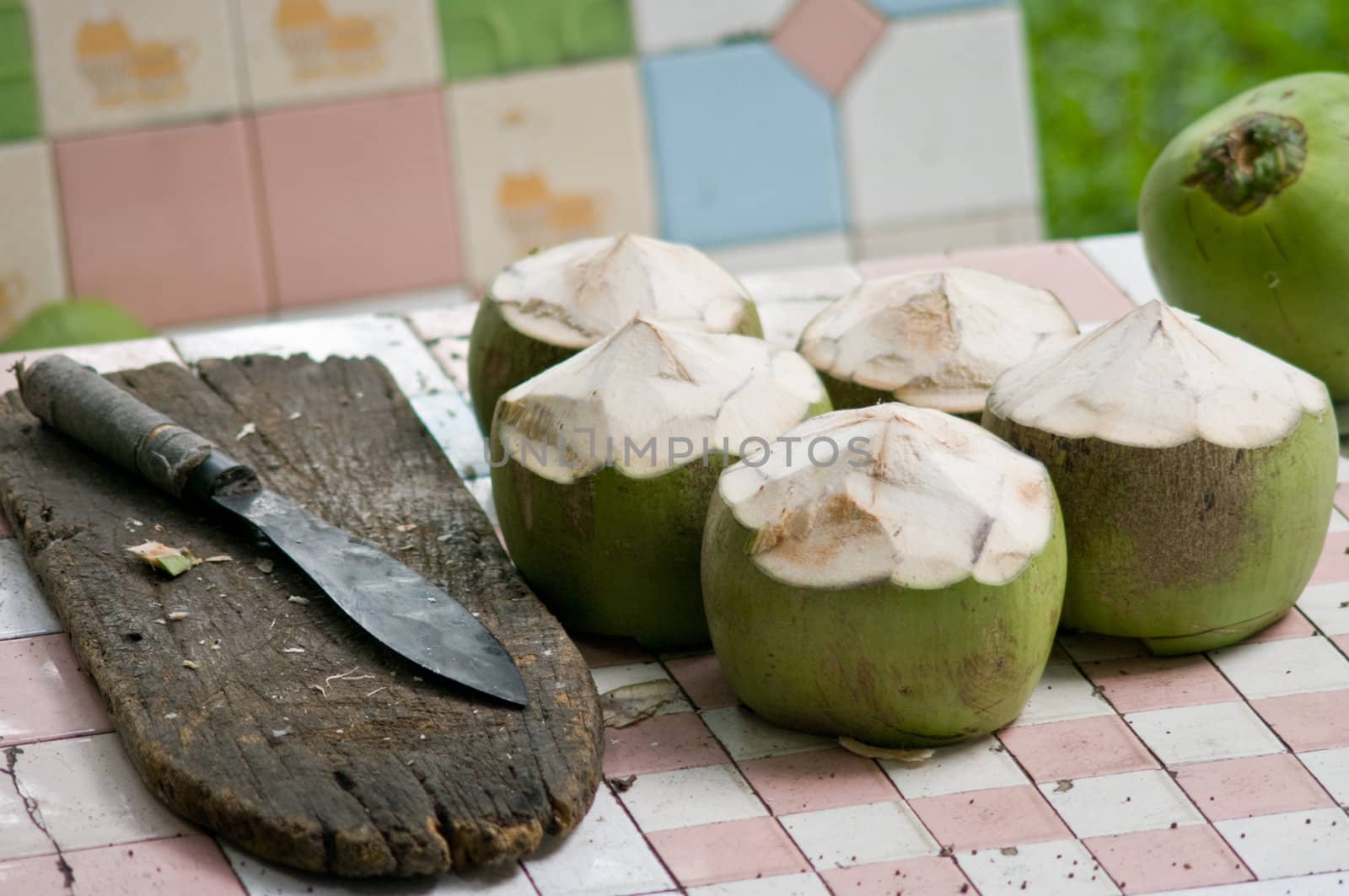 Coconut with knife by pixbox77