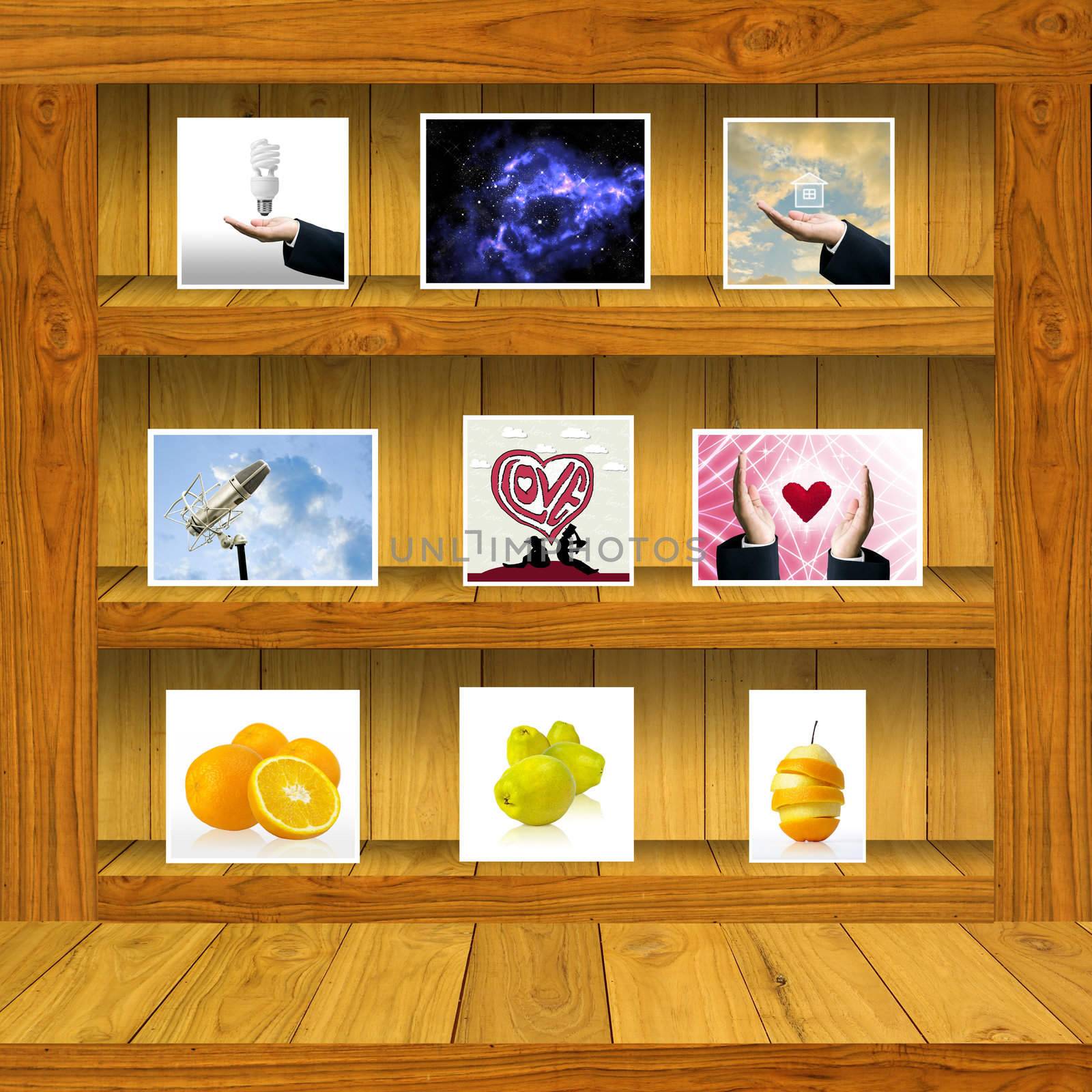 Wood shelf with stock photo inside by pixbox77