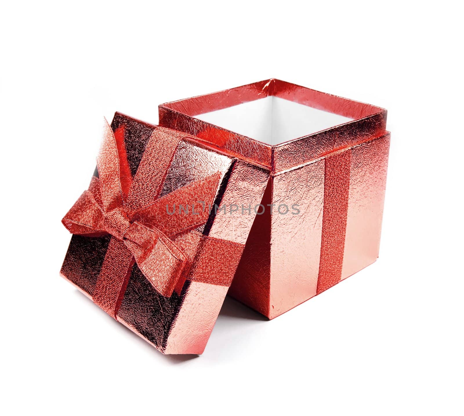 Opened red shining gift box isolated on white.
