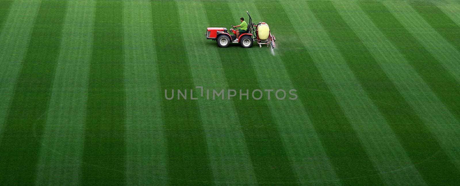 Sports field watering on Camp Nou stadium in Barcelona.