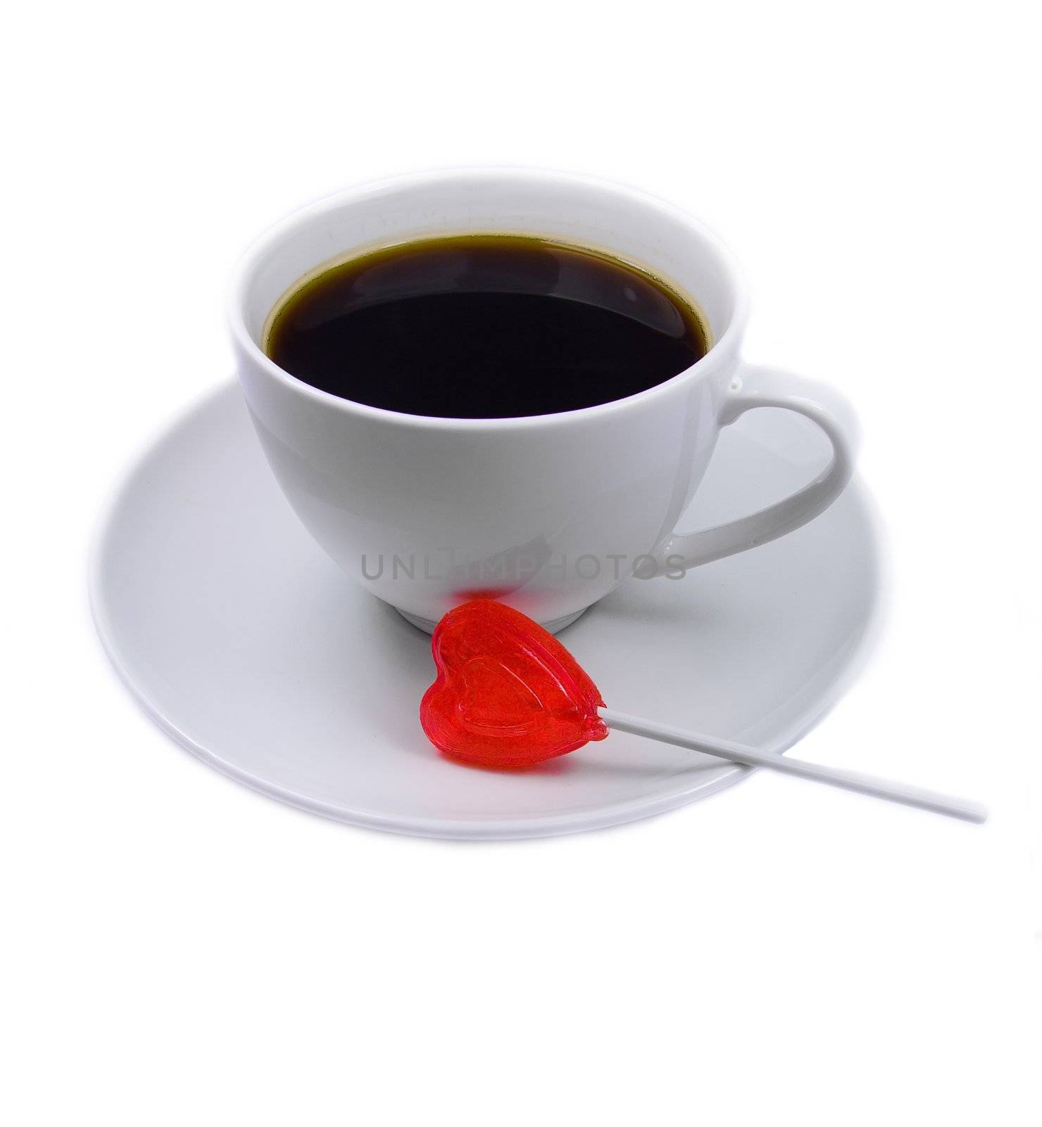Black coffee cup with red lollypop heart for Valentine's Day.