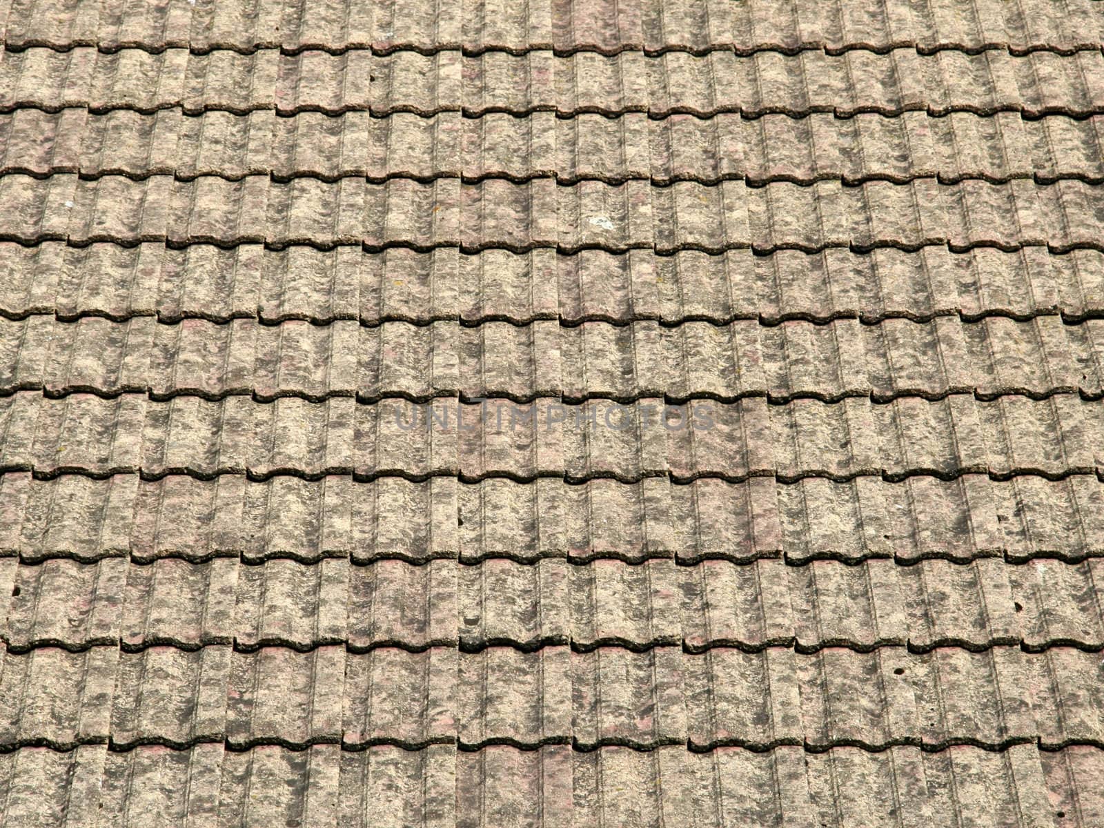 view of a roof with gray tiles structure