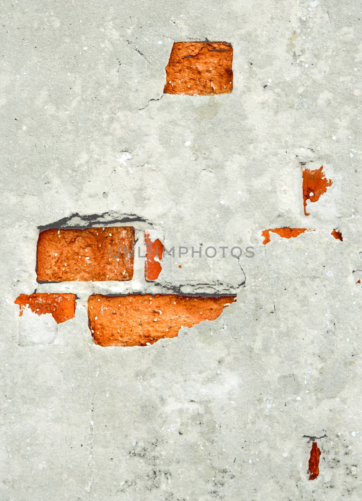 Old plaster falling from the wall.