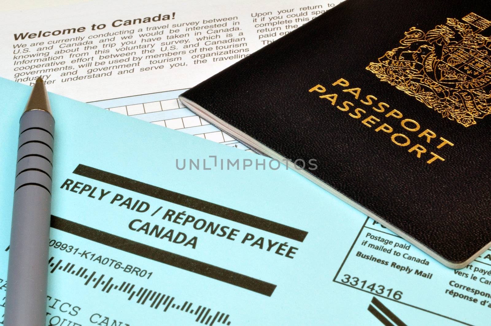 Tourism: passport, envelope and Canadian survey form