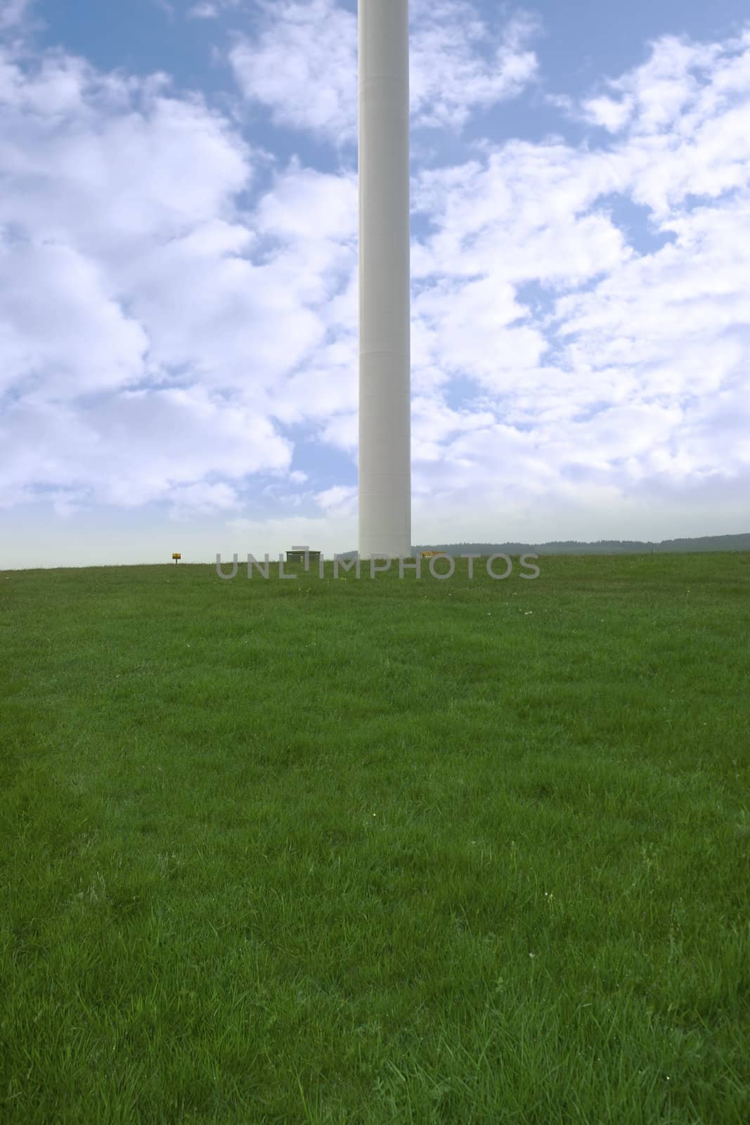 base of a windmill on lush irish countryside landscape in glenough county tipperary ireland