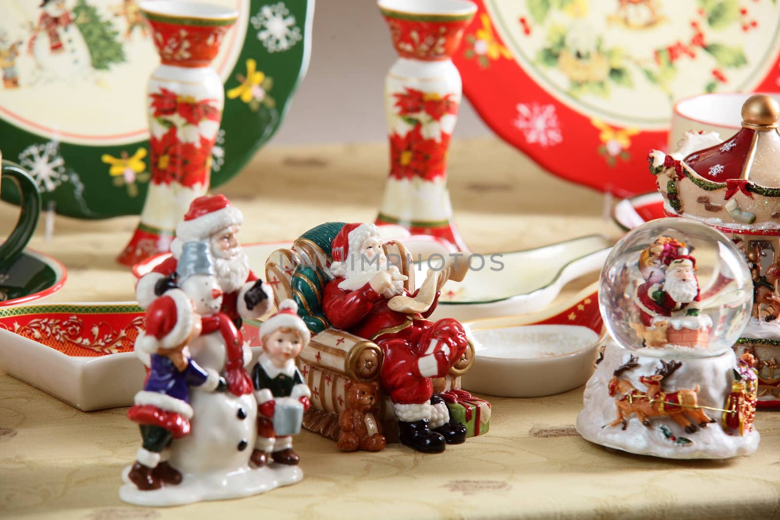 dishes and toys on table by fiphoto