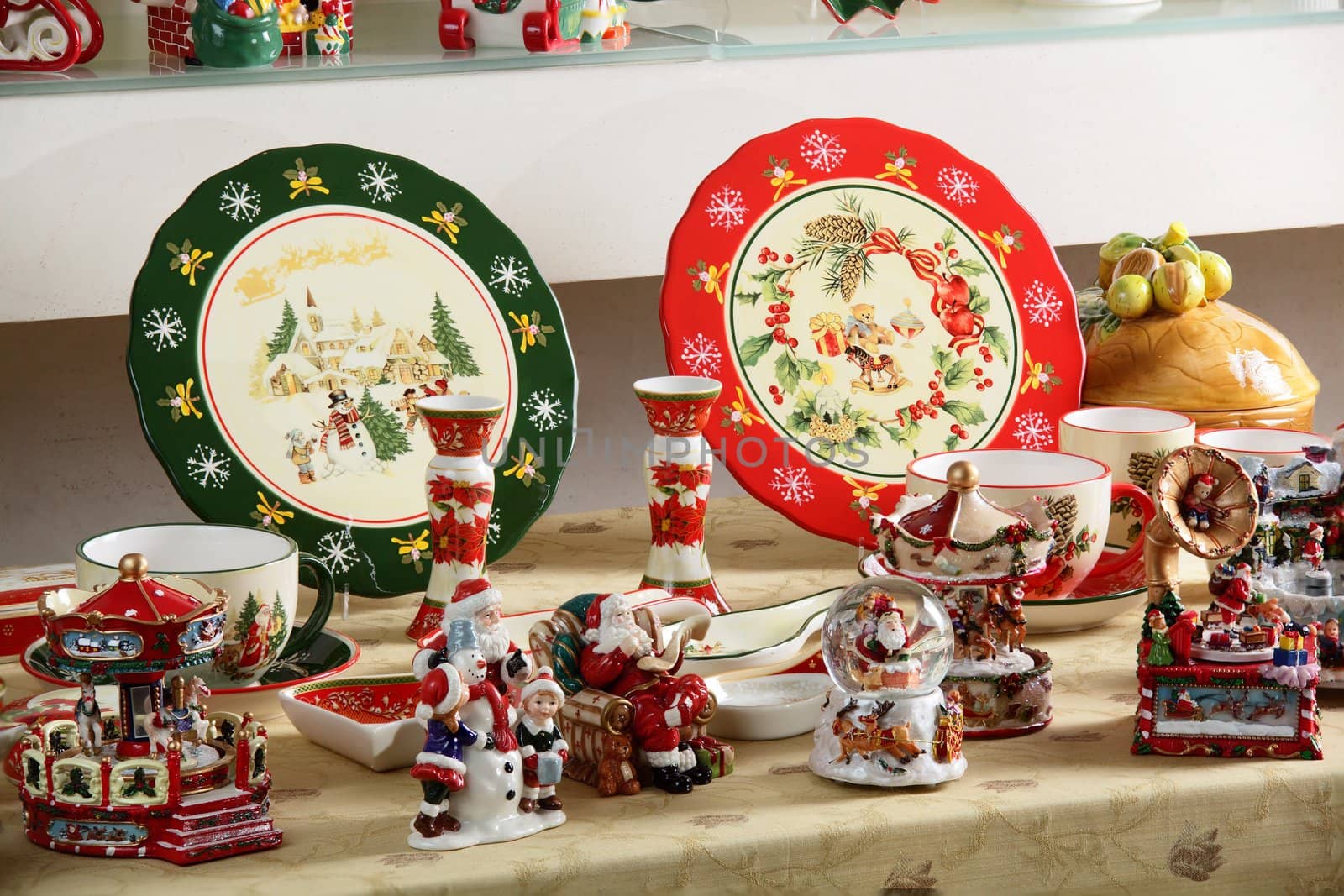 dishes and toys on table by fiphoto