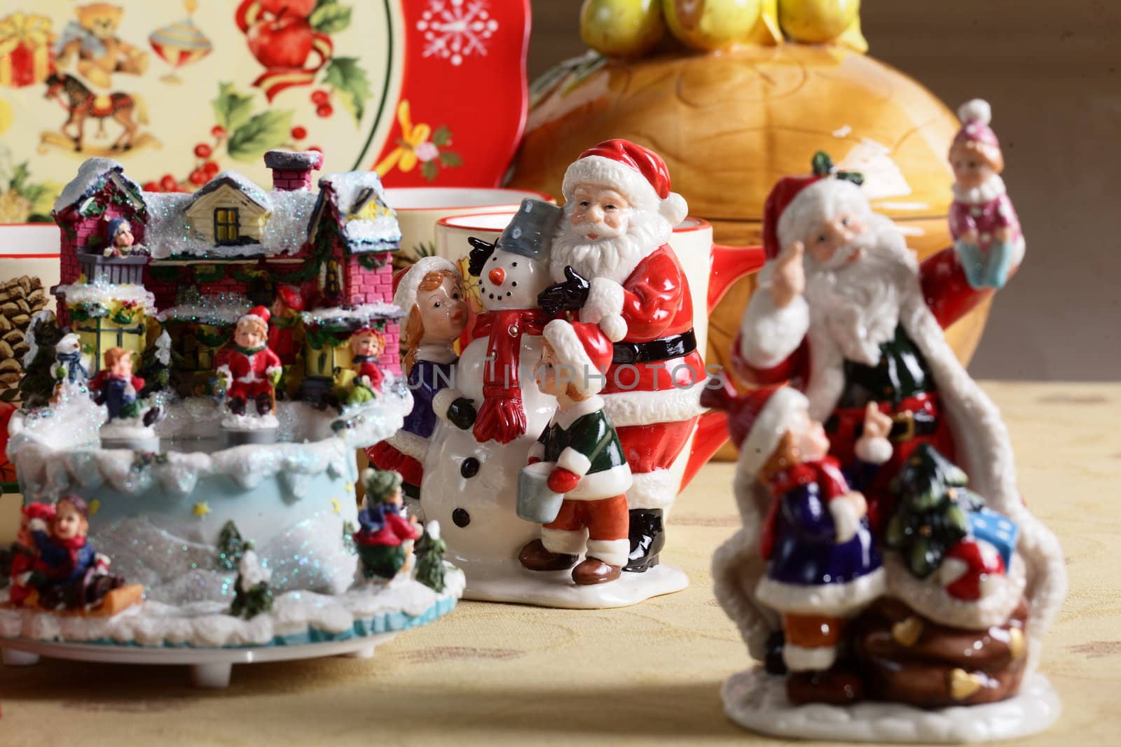 dishes and toys on table by fiphoto