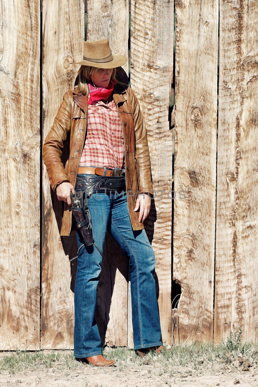 Portrait of a cowgirl. Western movie style 