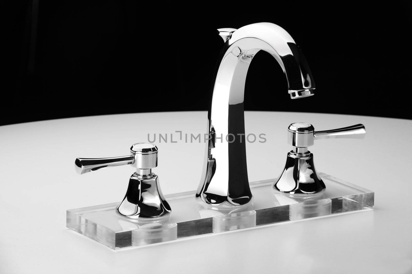 Water tap by fiphoto