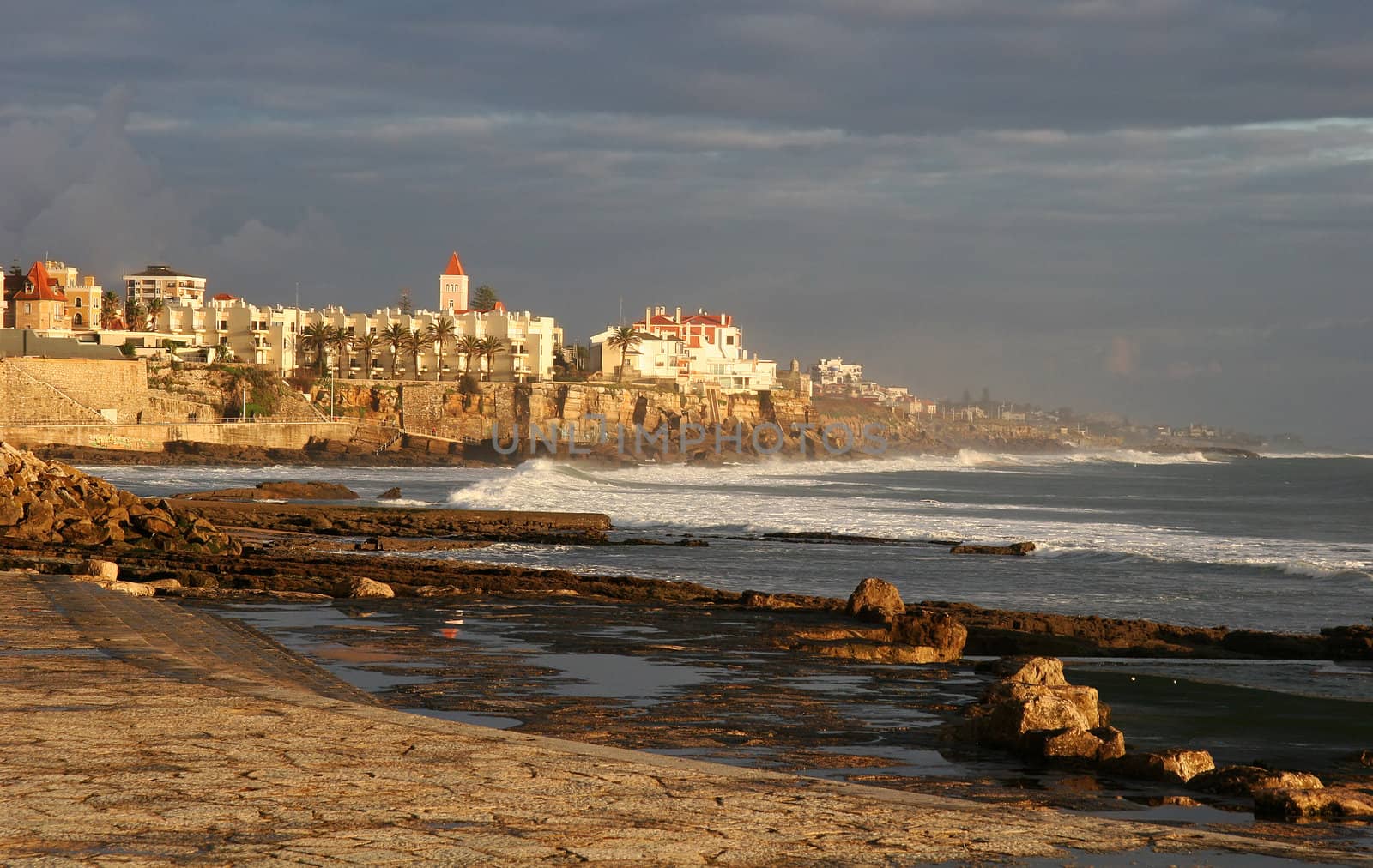 Beautiful sunset light on the beach of Estoril, Portugal