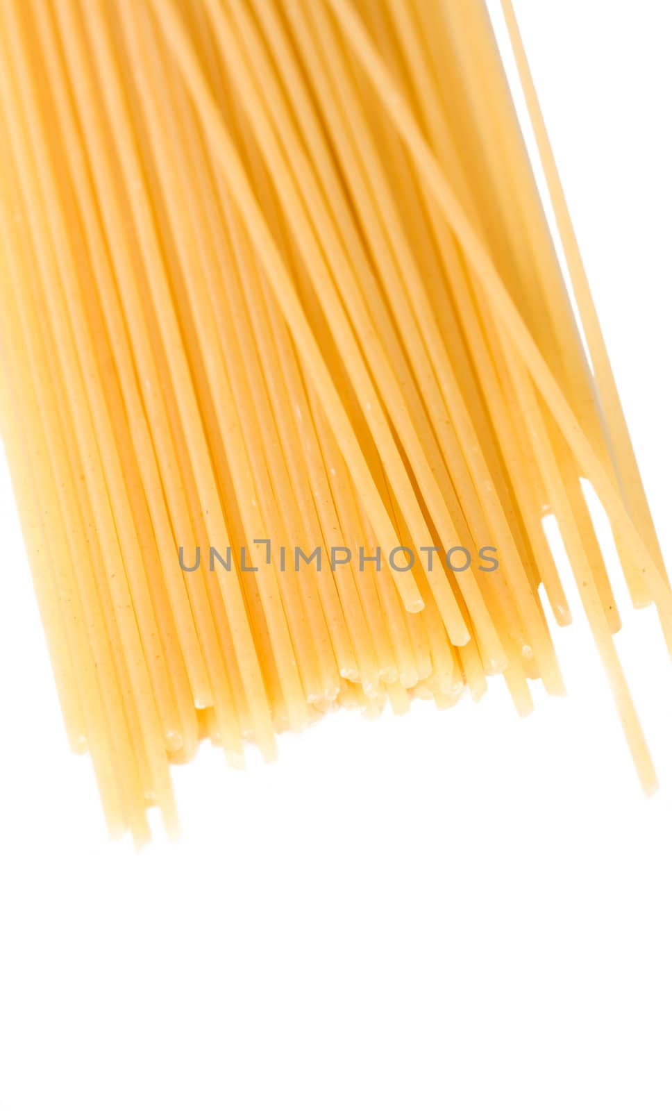 Raw pasta on white background