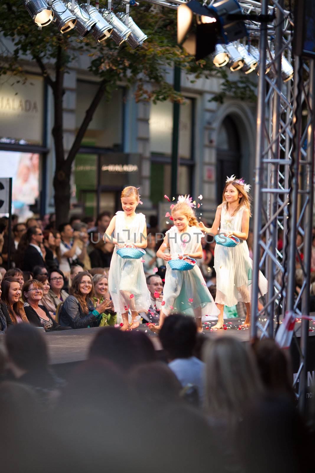 PRAGUE-SEPTEMBER 24: A children model walks the runway during the 2011 autumn/winter Czech designers collection during the Prague Fashion Weekend on September 24, 2011 in Prague, Czech Republic.