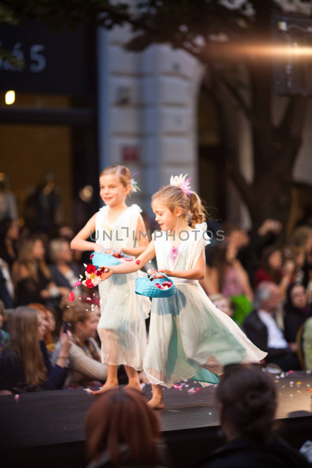 PRAGUE-SEPTEMBER 24: A children model walks the runway during the 2011 autumn/winter Czech designers collection during the Prague Fashion Weekend on September 24, 2011 in Prague, Czech Republic.