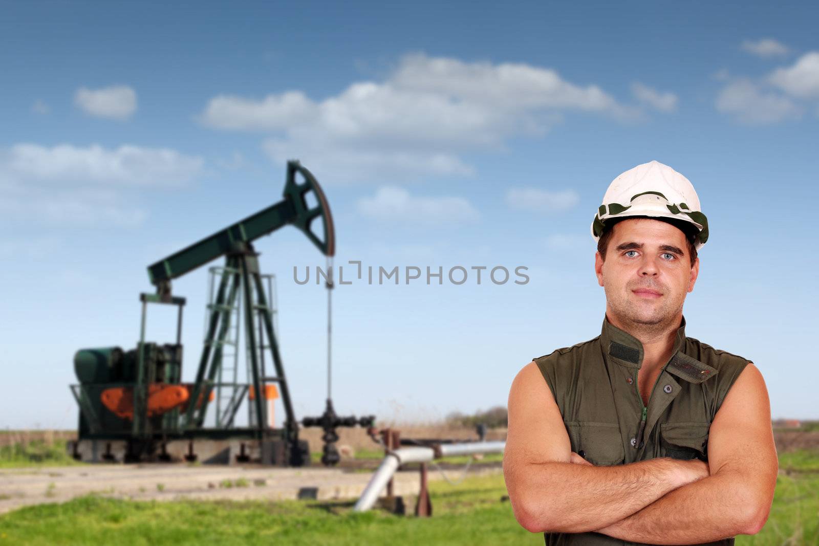 oil worker posing on oil field