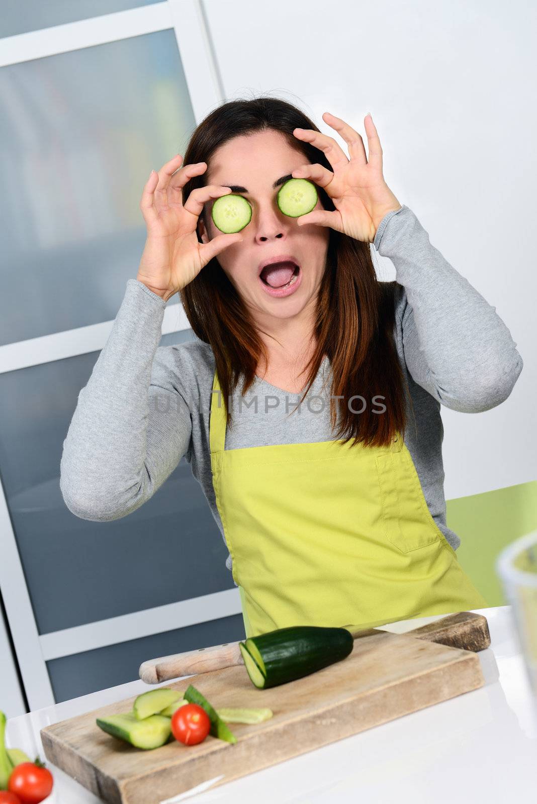 Young Woman Cooking. Healthy Food - Vegetable Salad. Diet. Dieting Concept. Healthy Lifestyle. Cooking At Home. Prepare Food 