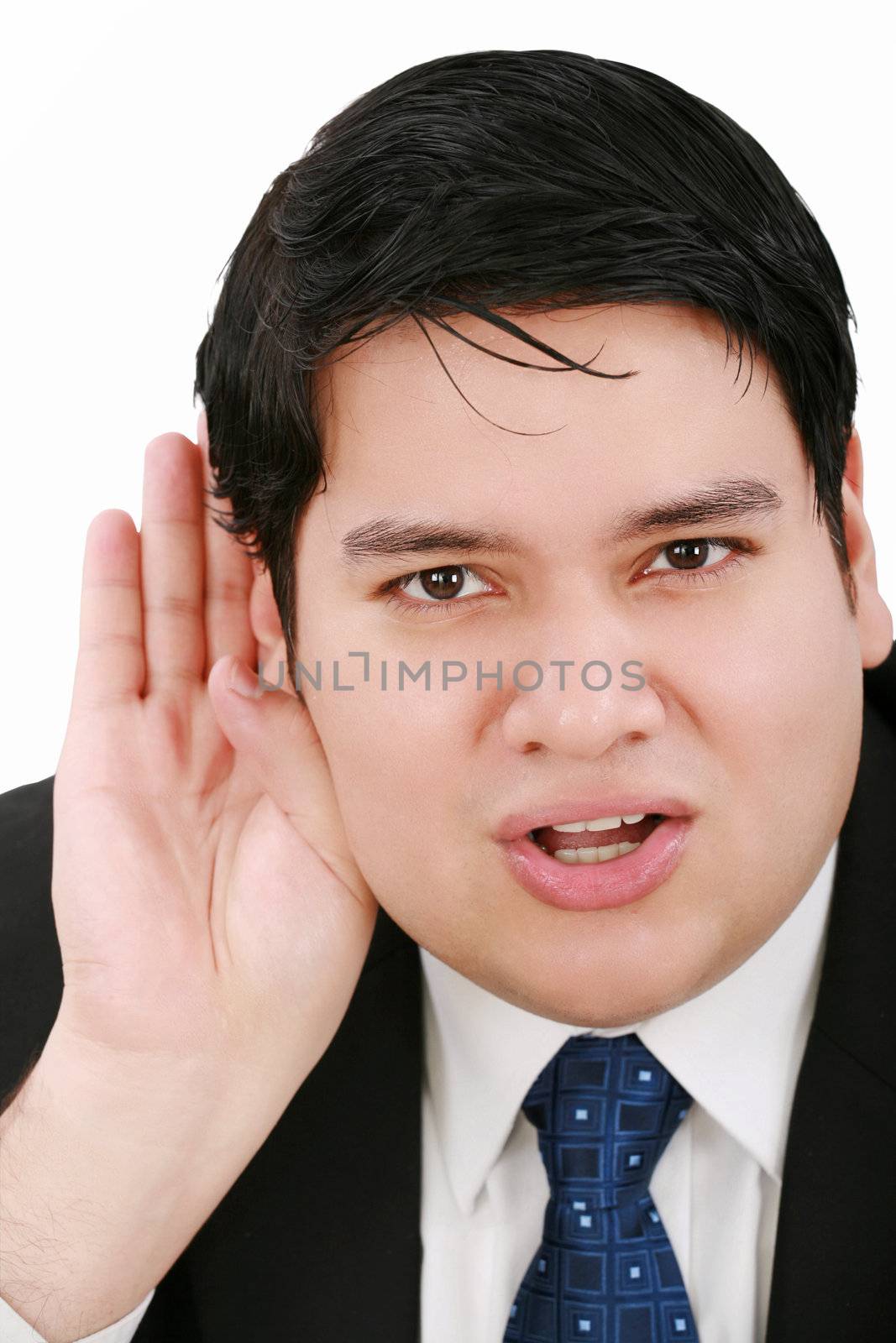 Young business man listening something isolated on white background