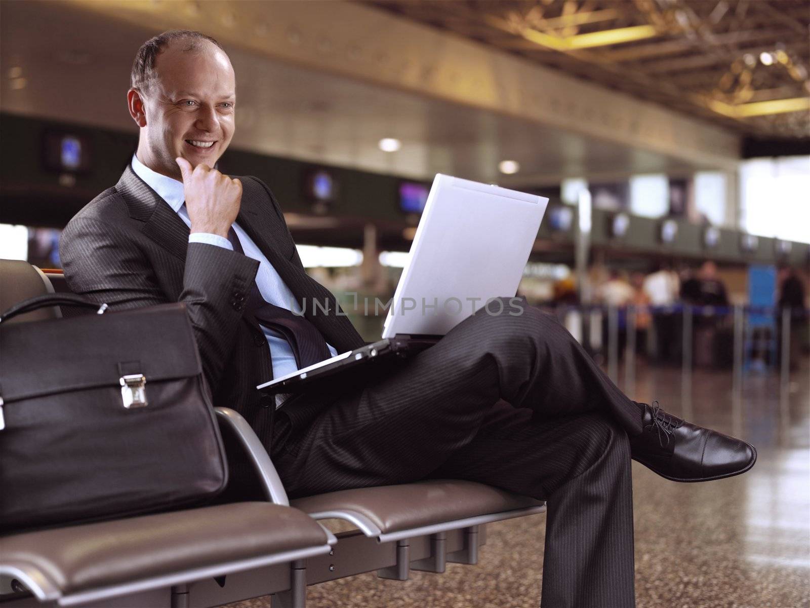 businessman and airport by ssuaphoto