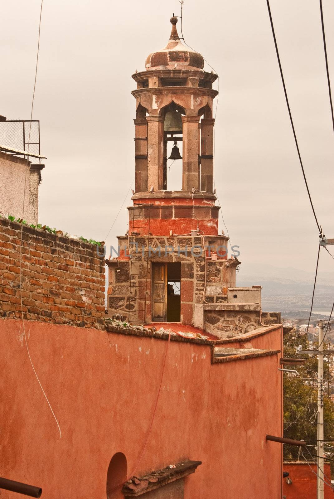 Mexican rooftop with belltower by emattil