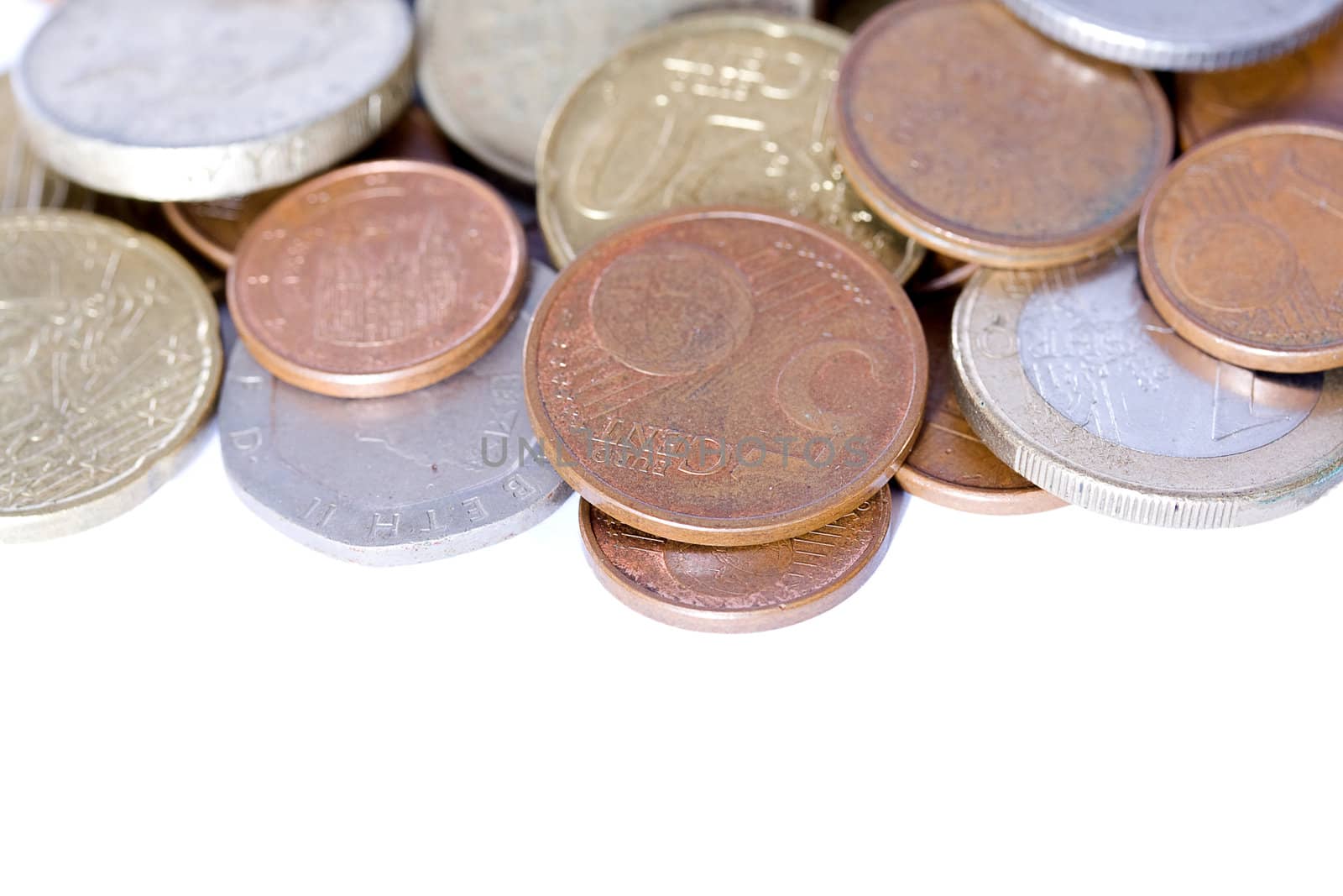 coins of different denominations isolated on white background