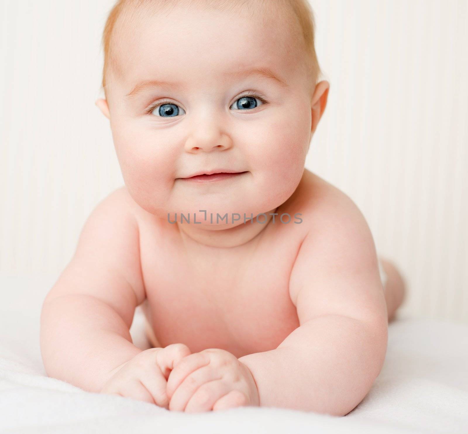 smiling adorable baby on sofa