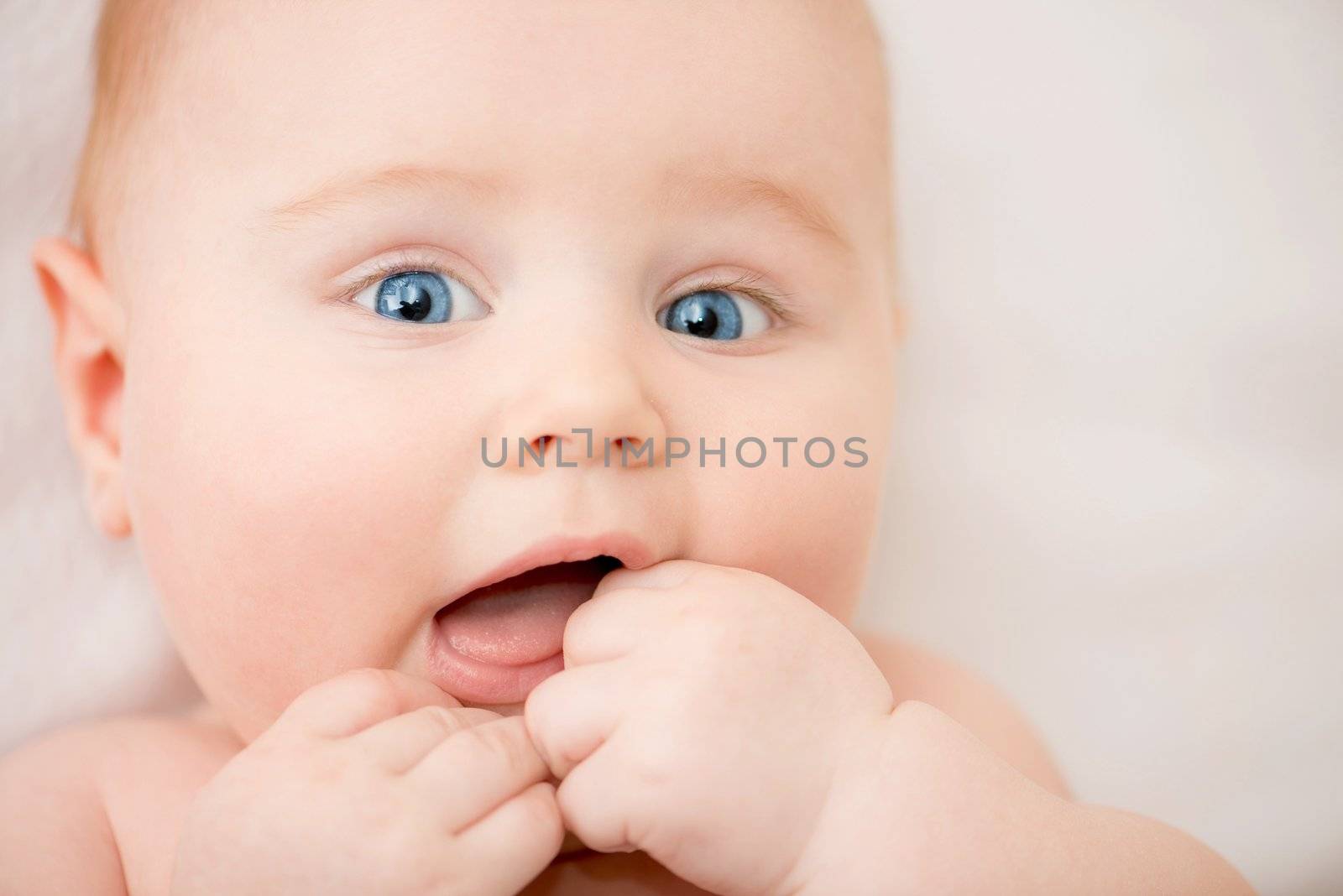 bright closeup portrait of cute baby