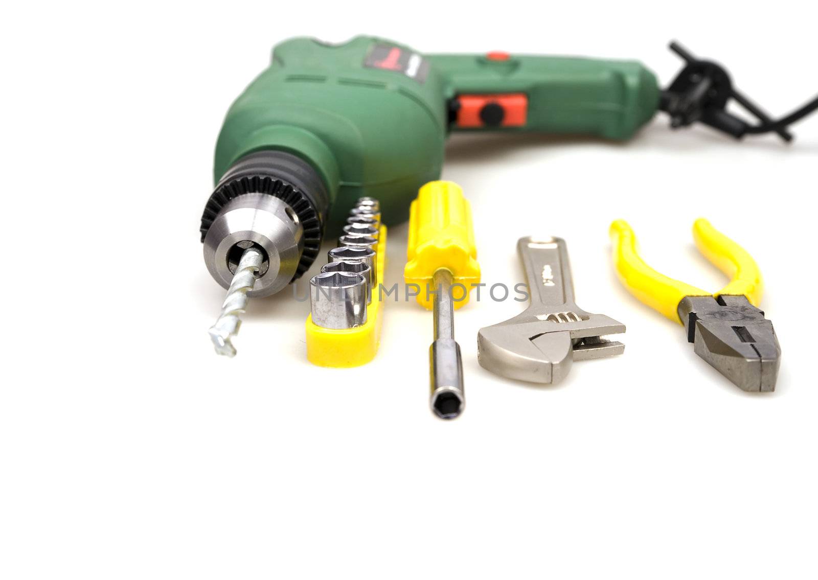 drill and other tools isolated on a white background