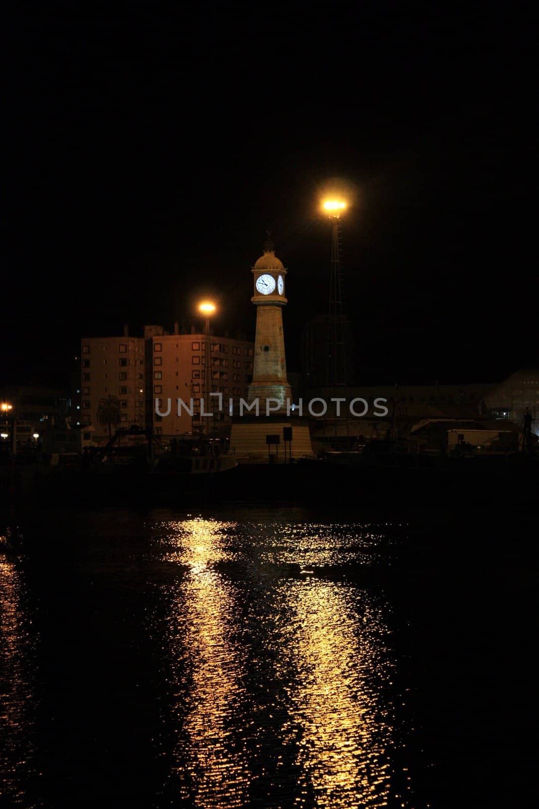 The clock at night in the Spain