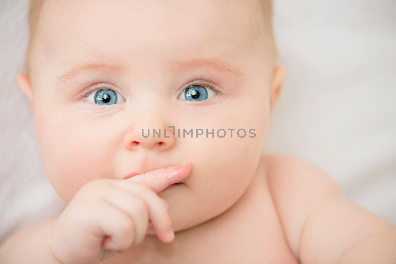 portrait of beautiful baby on sofa